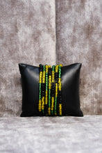 Load image into Gallery viewer,  Black represents the strength and resilience of the Jamaican people, yellow symbolizes natural resources, and green signifies hope and agriculture