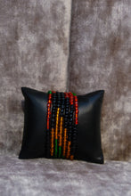 Load image into Gallery viewer,  The Zambian flag's green represents agriculture, red symbolizes the struggle for freedom, black stands for the people, and orange for mineral wealth